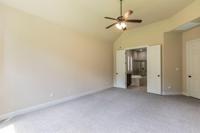 308 Angus Dr, Cedar Park, TX 78613 - unfurnished bedroom featuring light carpet, vaulted ceiling, baseboards, ensuite bathroom, and ceiling fan