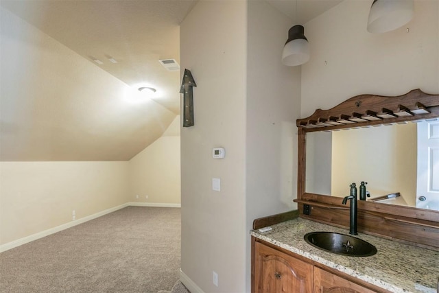 308 Angus Dr, Cedar Park, TX 78613 - bathroom featuring vanity, baseboards, and lofted ceiling