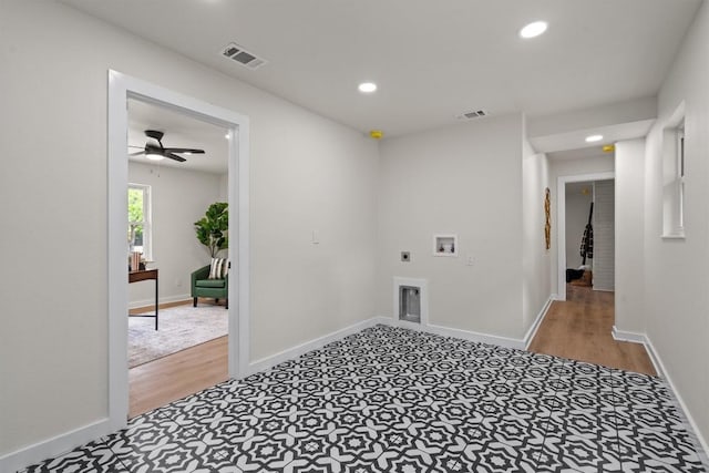 2901 Gabriel View Dr, Georgetown, TX 78628 - washroom featuring hookup for an electric dryer, washer hookup, light wood-style flooring, recessed lighting, and ceiling fan