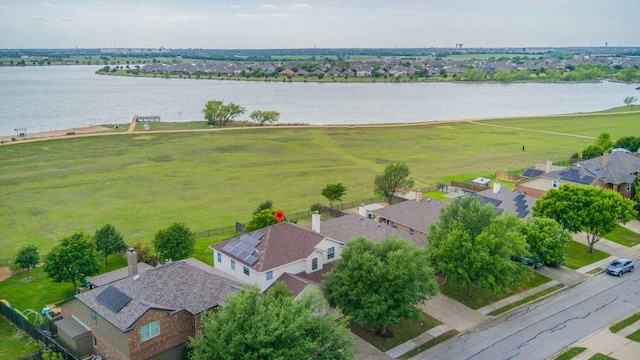 bird's eye view with a water view and a residential view