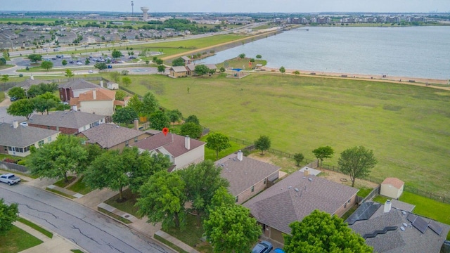 bird's eye view with a water view and a residential view