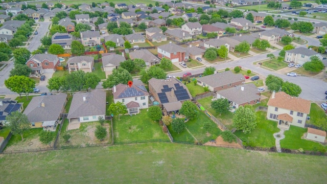 birds eye view of property with a residential view
