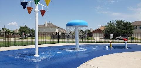view of property's community with fence