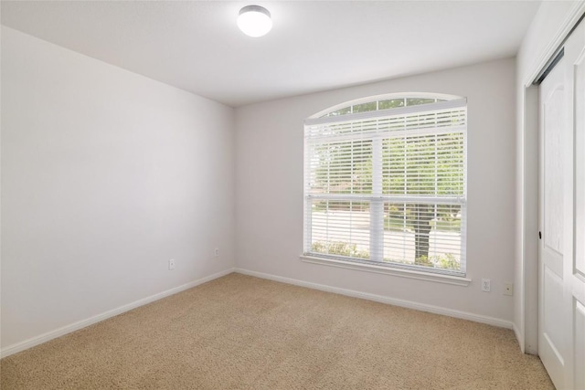 1317 Rimstone Dr, Cedar Park, TX 78613 - empty room with light colored carpet and plenty of natural light