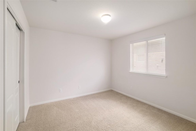 1317 Rimstone Dr, Cedar Park, TX 78613 - unfurnished bedroom featuring light carpet and a closet