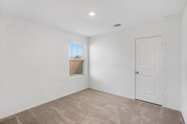 2305 Tornado Aly, Lockhart, TX 78644 - carpeted empty room featuring visible vents and baseboards