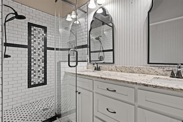 full bathroom with a sink and a stall shower
