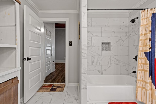 bathroom featuring shower / bath combo with shower curtain, marble finish floor, baseboards, and ornamental molding