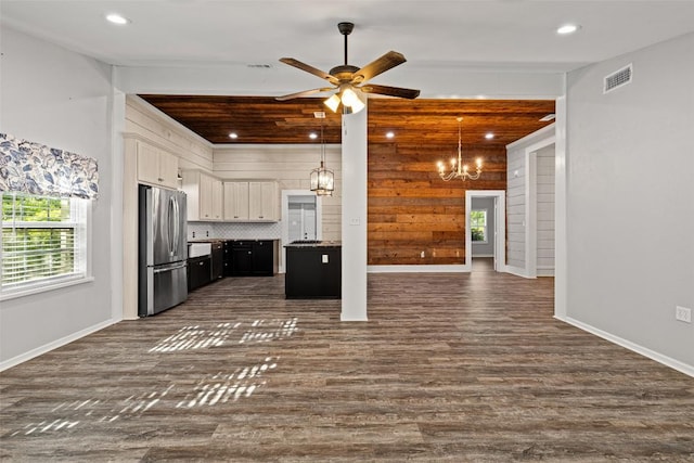 kitchen featuring open floor plan, visible vents, freestanding refrigerator, recessed lighting, and dark wood-type flooring