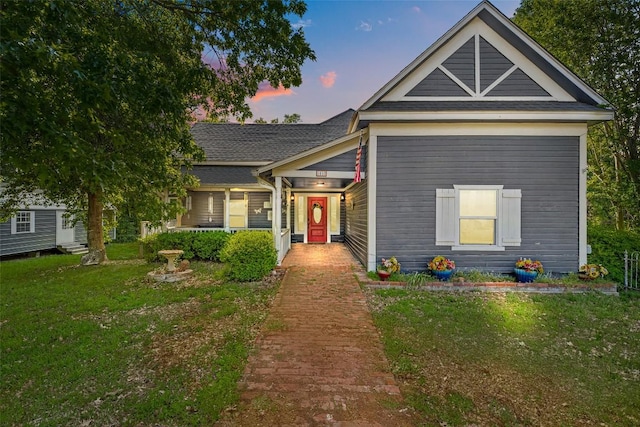 view of front of home with a front lawn