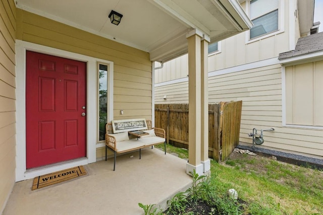 300 Wapiti Rd, Buda, TX 78610 - view of exterior entry featuring covered porch and board and batten siding