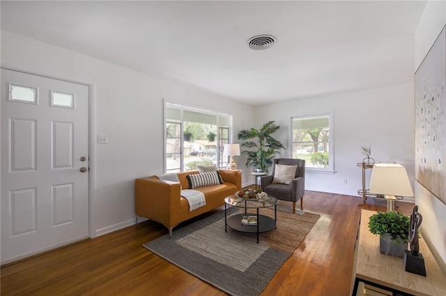 1002 Brentwood St, Austin, TX 78757 - living area featuring wood finished floors and baseboards