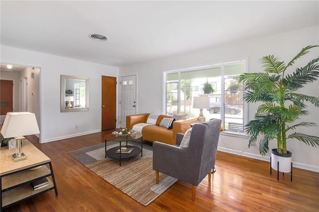 1002 Brentwood St, Austin, TX 78757 - living room with baseboards and wood finished floors