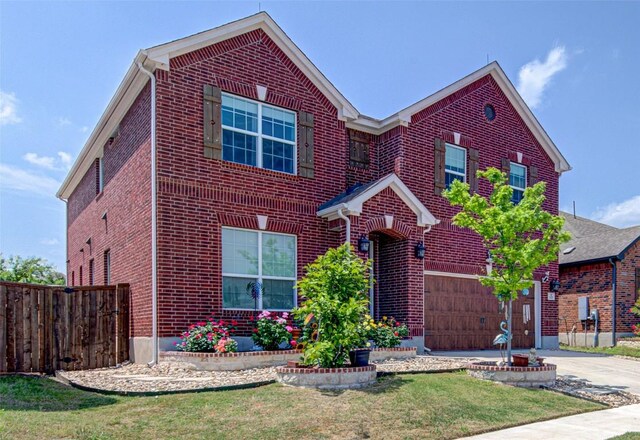 1117 Arbor Acres Loop, Leander, TX 78641 - traditional-style home with brick siding, driveway, and an attached garage