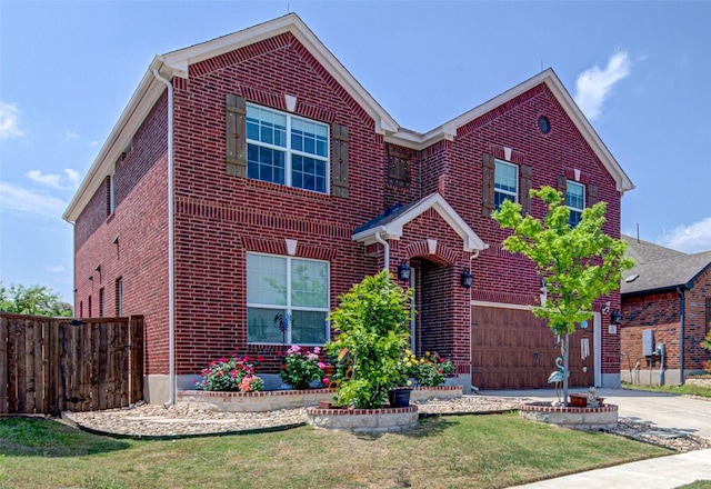 1117 Arbor Acres Loop, Leander, TX 78641 - traditional-style house with brick siding, driveway, and an attached garage