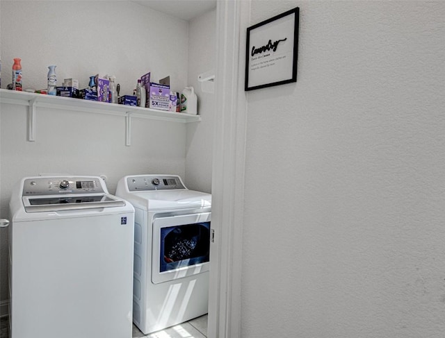 1117 Arbor Acres Loop, Leander, TX 78641 - laundry room with washing machine and dryer