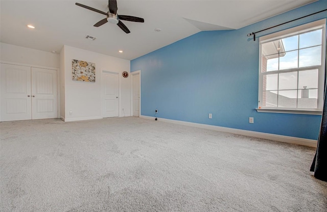 1117 Arbor Acres Loop, Leander, TX 78641 - unfurnished bedroom featuring lofted ceiling, baseboards, a closet, carpet flooring, and recessed lighting