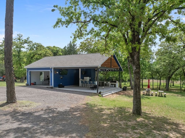 129 Valley Spur, Smithville, TX 78957 - view of property's community with a yard