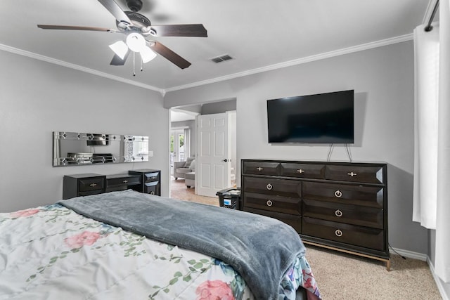 129 Valley Spur, Smithville, TX 78957 - bedroom featuring carpet flooring, crown molding, and a ceiling fan