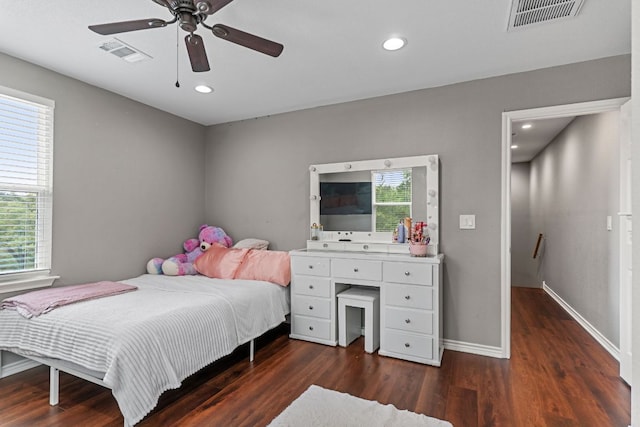 129 Valley Spur, Smithville, TX 78957 - bedroom with baseboards, visible vents, recessed lighting, and dark wood-style floors