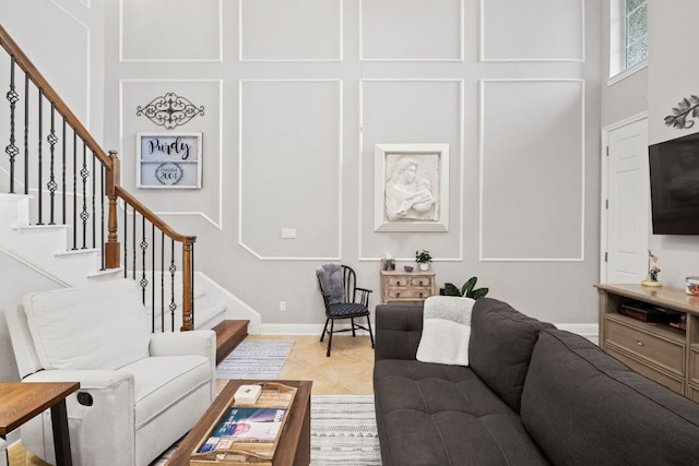 218 Sunrise Ridge Loop, Lakeway, TX 78738 - living room with stairway and a decorative wall