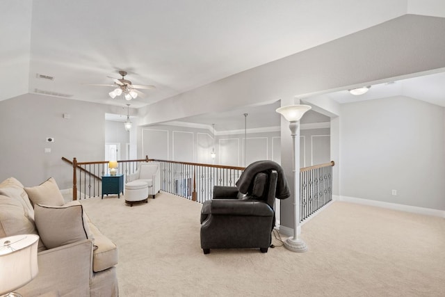 218 Sunrise Ridge Loop, Lakeway, TX 78738 - living area featuring carpet flooring, an upstairs landing, and a ceiling fan