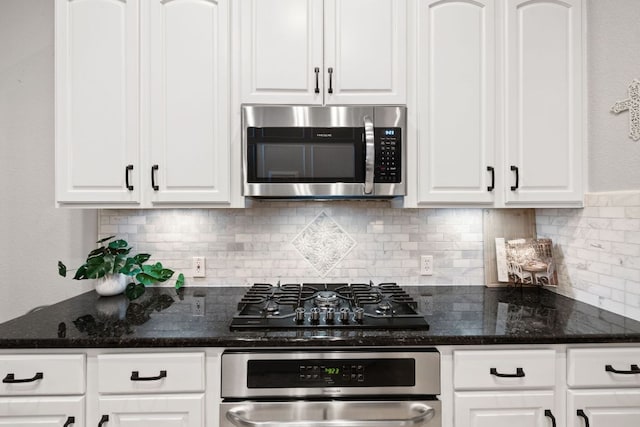218 Sunrise Ridge Loop, Lakeway, TX 78738 - kitchen featuring stainless steel microwave, black gas cooktop, oven, and decorative backsplash
