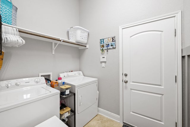 218 Sunrise Ridge Loop, Lakeway, TX 78738 - laundry room with washing machine and dryer and light tile patterned floors