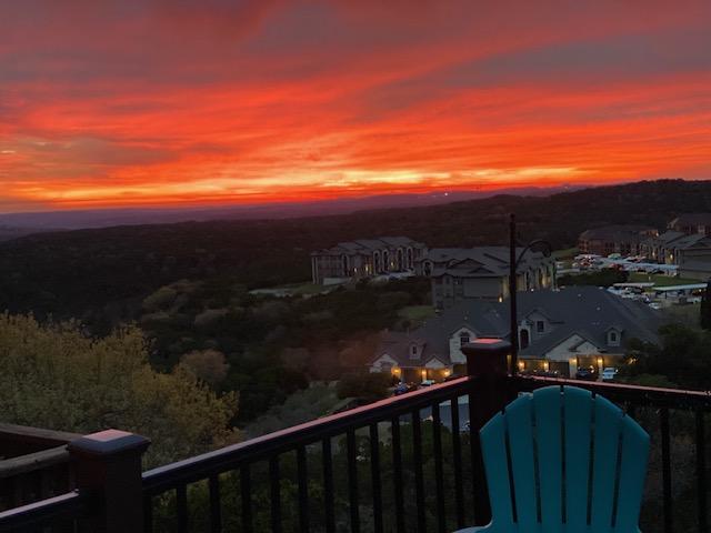 218 Sunrise Ridge Loop, Lakeway, TX 78738 - view of balcony at dusk