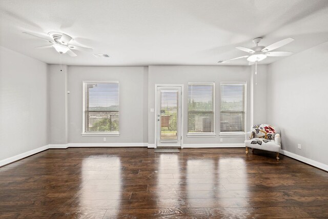 218 Sunrise Ridge Loop, Lakeway, TX 78738 - empty room with a ceiling fan and wood finished floors