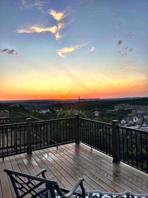 218 Sunrise Ridge Loop, Lakeway, TX 78738 - view of deck at dusk
