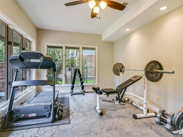 2305 Manana St, Austin, TX 78730 - exercise area featuring ceiling fan, baseboards, recessed lighting, and stone finish floors