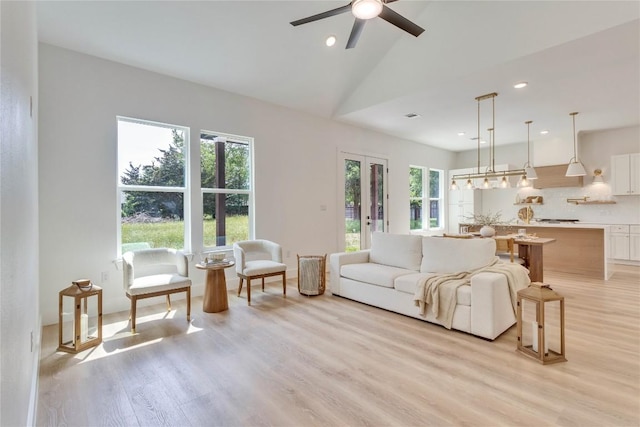 353 Nene Ln, Bastrop, TX 78602 - living room featuring a ceiling fan, light wood finished floors, recessed lighting, and vaulted ceiling