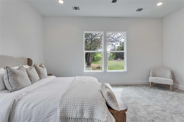 carpeted bedroom featuring recessed lighting, visible vents, baseboards, and ceiling fan