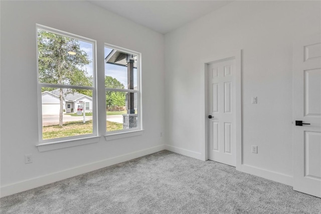 353 Nene Ln, Bastrop, TX 78602 - unfurnished room with carpet and baseboards