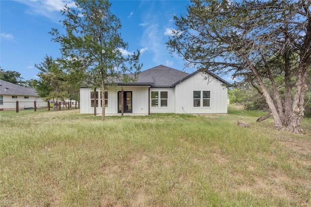 353 Nene Ln, Bastrop, TX 78602 - rear view of property with a shingled roof