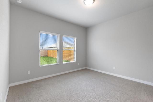 208 Lazy Lizzy Rd, Jarrell, TX 76537 - spare room with carpet floors and baseboards