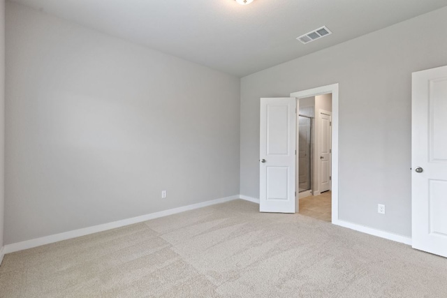 208 Lazy Lizzy Rd, Jarrell, TX 76537 - unfurnished bedroom with light colored carpet and baseboards