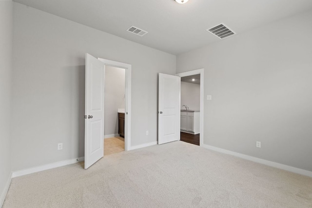 208 Lazy Lizzy Rd, Jarrell, TX 76537 - unfurnished bedroom featuring carpet and ensuite bath