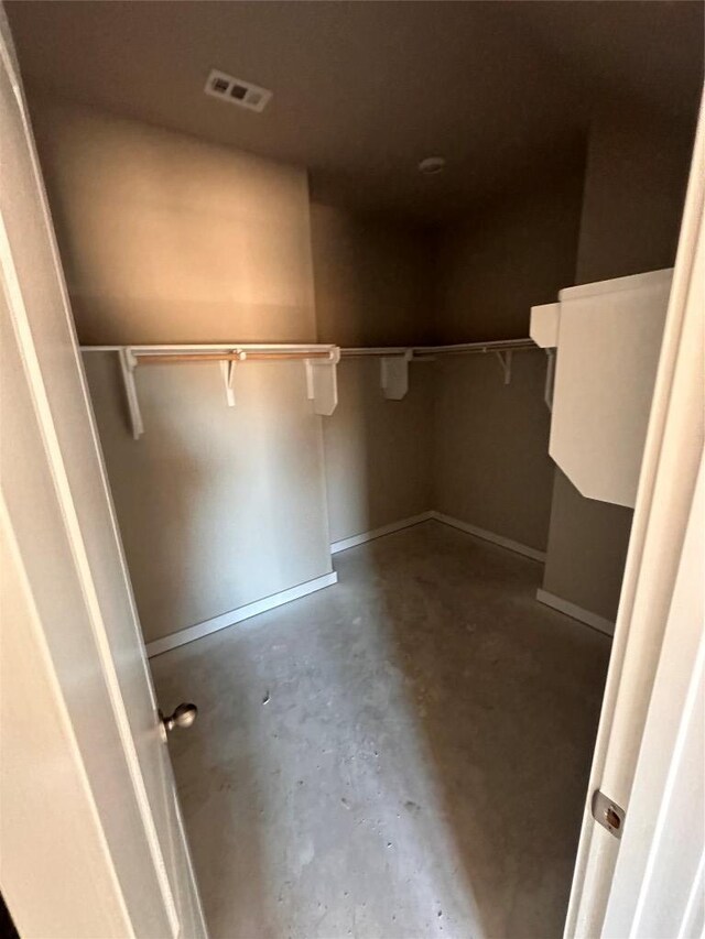 spacious closet with visible vents