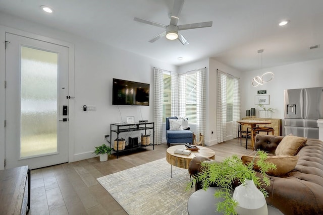 413 W Odell St Unit 2, Austin, TX 78752 - living area featuring light wood finished floors, baseboards, a ceiling fan, and recessed lighting