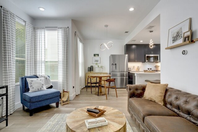413 W Odell St Unit 2, Austin, TX 78752 - living area with recessed lighting and light wood-type flooring