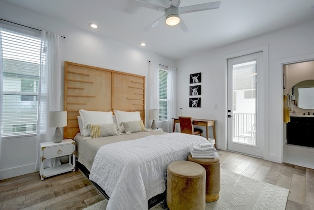 bedroom featuring recessed lighting, light wood-type flooring, access to exterior, and baseboards