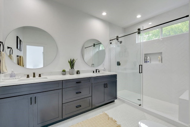 413 W Odell St Unit 2, Austin, TX 78752 - full bath with double vanity, a shower stall, recessed lighting, and tile patterned floors