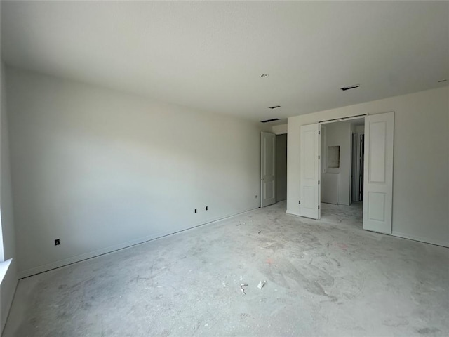 22120 Cross Timber Bnd, Lago Vista, TX 78645 - unfurnished bedroom with unfinished concrete floors and baseboards