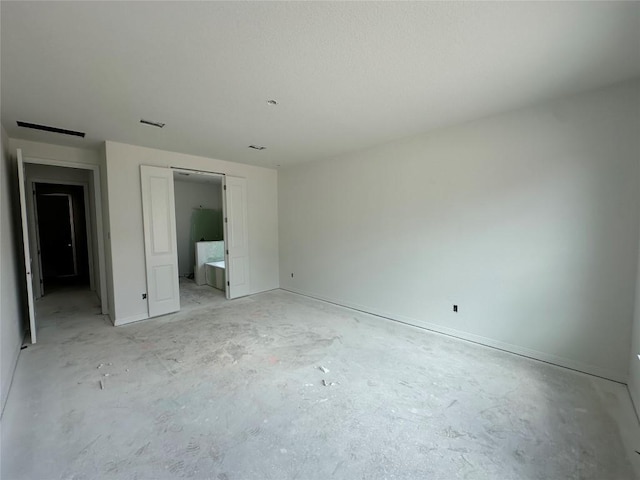 22120 Cross Timber Bnd, Lago Vista, TX 78645 - unfurnished bedroom featuring unfinished concrete floors and ensuite bathroom