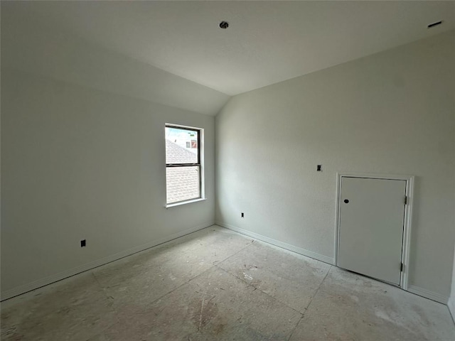 22120 Cross Timber Bnd, Lago Vista, TX 78645 - unfurnished room with lofted ceiling and baseboards