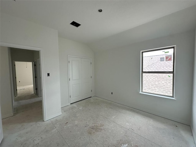 22120 Cross Timber Bnd, Lago Vista, TX 78645 - unfurnished bedroom featuring lofted ceiling and a closet