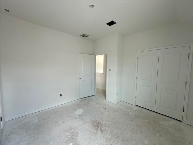 22120 Cross Timber Bnd, Lago Vista, TX 78645 - unfurnished bedroom with a closet and concrete flooring