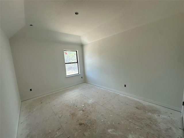 22120 Cross Timber Bnd, Lago Vista, TX 78645 - unfurnished room with lofted ceiling and baseboards